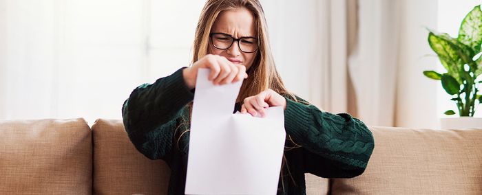 person_tearing_paper.jpg